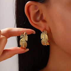 Vioraia Feather Crest Earrings
