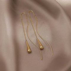 Vioraia Golden Teardrop Tassel Earrings