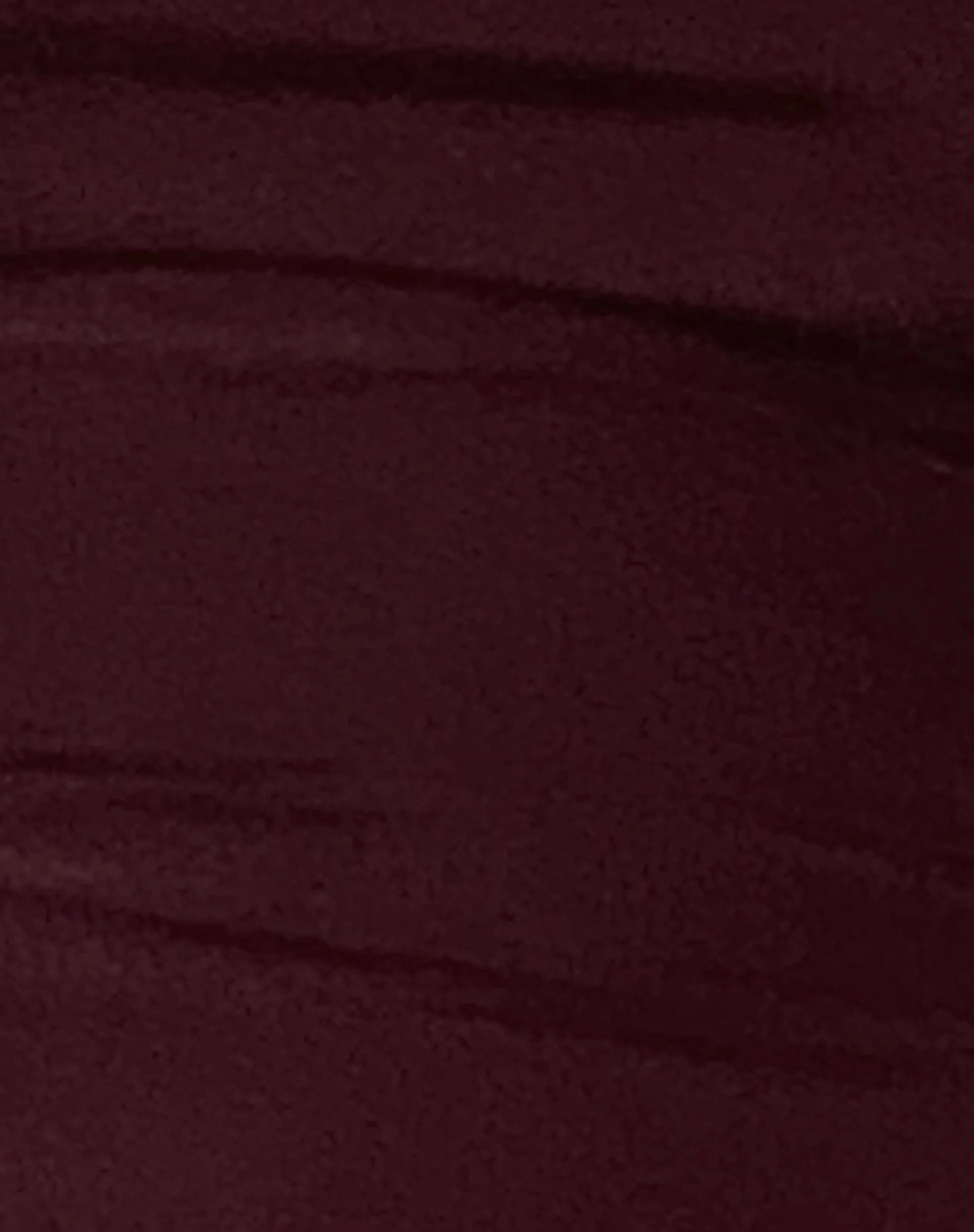 Litera Ruffle Mini Dress in Deep Plum with Rosette