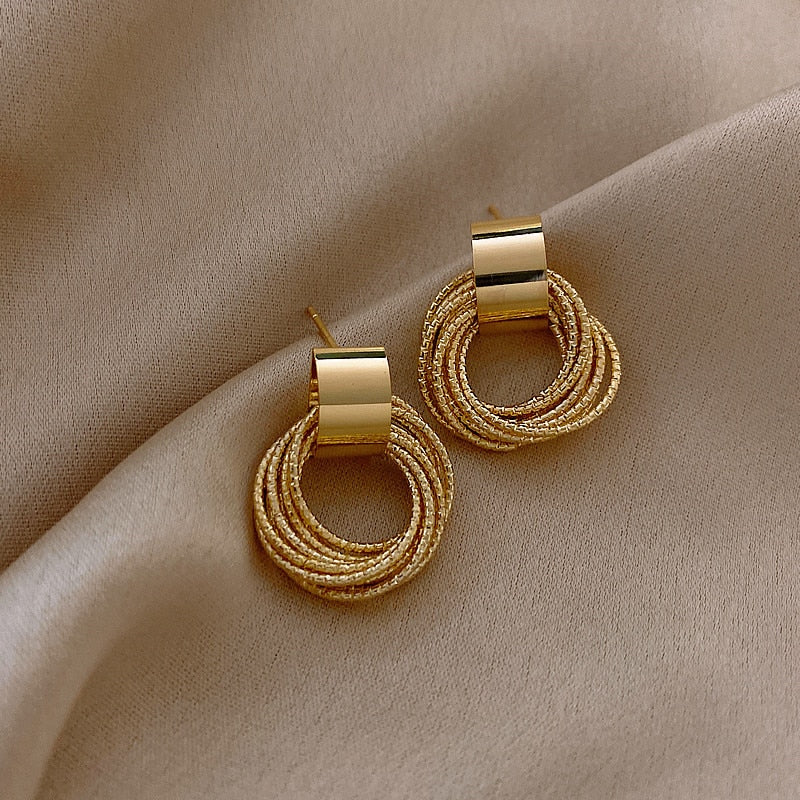 Vioraia Metal Ring Tassel Earrings