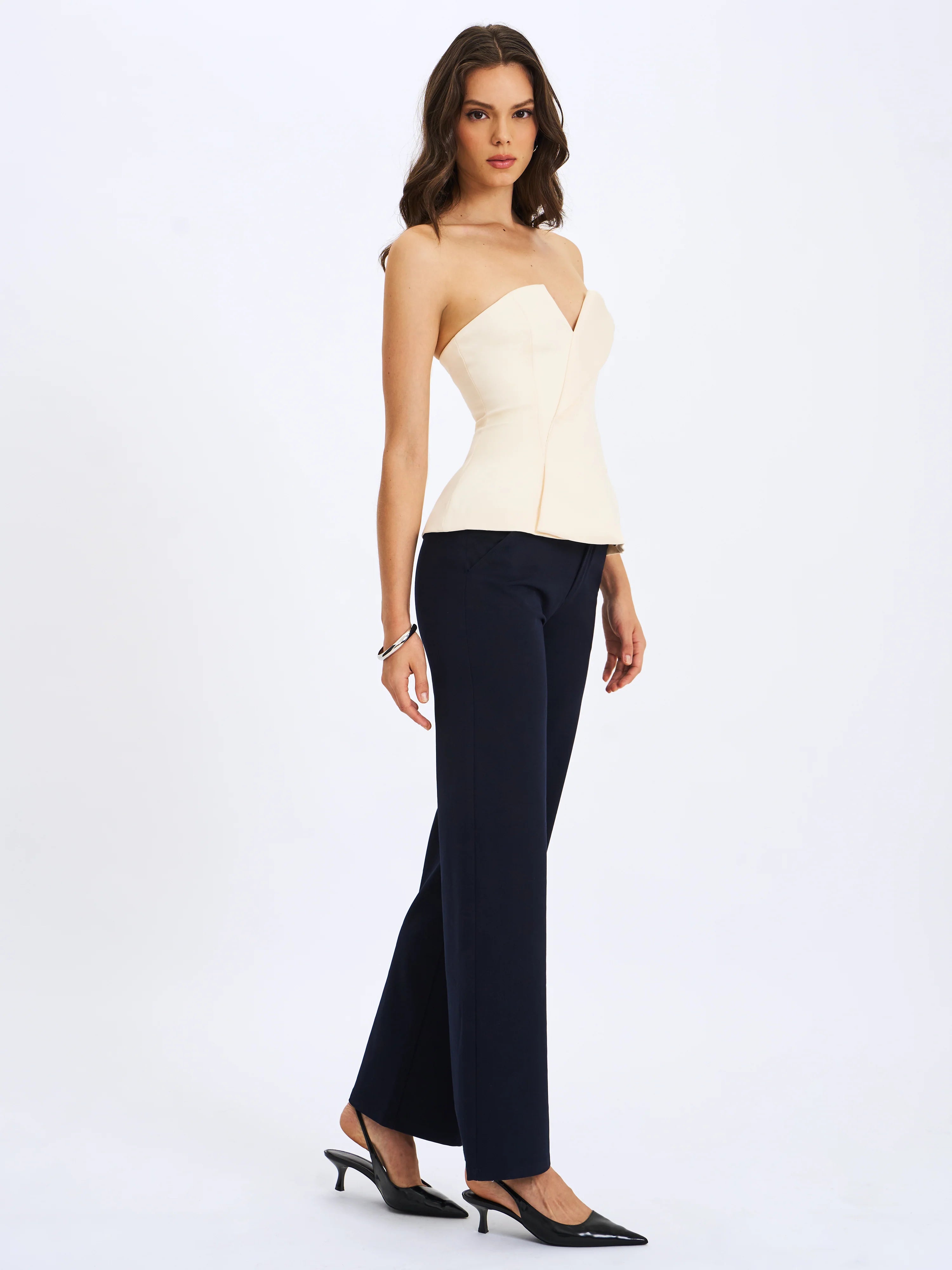 Yani Ivory Asymmetrical Lapel Sleeveless Peplum Top